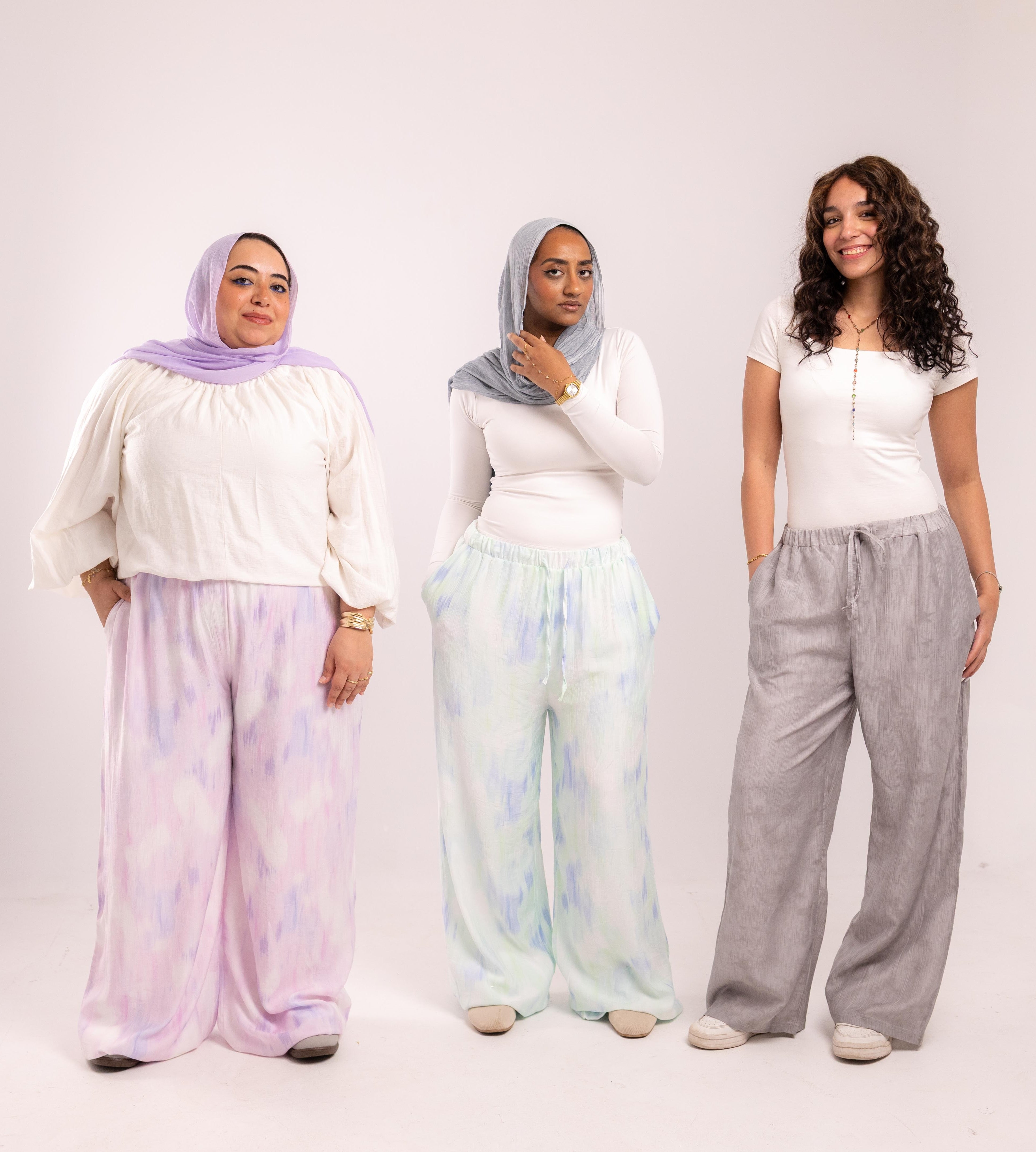 Three women wearing ALLIO summer pants